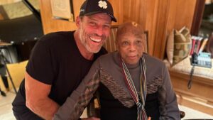 Tony Robbins Instagram - Throughout my life, I’ve had the absolute honor of connecting with extraordinary people — presidents, athletes, musicians, and world leaders. Among all these legendary humans, one who truly stands out is our dear friend, THE ONE AND ONLY @quincyjones. 🎶

Quincy turned 90 last month while I was out of the country, so Sage and Mary and I  made it a priority to connect with him when we were back in LA — we had to celebrate this remarkable man’s life!

Having Quincy as a friend is an indescribable blessing. He's a PROLIFIC orchestrator who has worked with everyone from Ray Charles, Duke Ellington and Count Basie, to Frank Sinatra and the Rat Pack, Michael Jackson, Tupac, The Weeknd, John Legend and countless others.

His astounding accomplishments in the music industry include multiple Grammys and even the esteemed Grammy Legend Award.✨ It's genuinely inspiring to witness his phenomenal journey and historical impact. 

Quincy’s MUSICAL GENIUS, his ability to connect with others AND bring out the best in them has left a LASTING impact on countless generations.

One example SHINES through in his iconic work, "We Are the World," released in 1985 that raised more than $60 MILLION in humanitarian aid for people suffering from famine in Africa, most notably Ethiopia.

Quincy's incredible legacy and contribution is a testament to the power of LOVE and UNITY, transcending boundaries and uniting people through the UNIVERSAL LANGUAGE of MUSIC. 🫂❤️☮️🎵

Q also just wrote a NEW BOOK that I highly recommend, it’s called 12 Notes. 📖

All the music on Earth originates from just 12 notes!  Q’s ability to make magic from those 12 and the story of his awe-inspiring life lessons is all wrapped up in this little book. I believe you'll be deeply moved. This man is a national treasure!

My love and appreciation for you, Q, are boundless. Words cannot express how grateful I am to have you in my life all these years and the profound emotions I feel when I think about our friendship. You mean the world to me and Sage and we are forever thankful for your presence in our life! 🙏🤟🙌