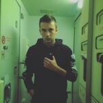 Tyler Joseph Instagram - airplane bathroom photograph of self to prove i am self.