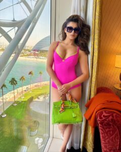 Urvashi Rautela Instagram - Versace Baby 👙🩷💖💕💞💓💗 ☆ ☆ ☆ ☆ ☆ ☆ ☆ ☆ #love #UrvashiRautela #UR1 #pink