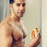 Varun Dhawan Instagram - Sunday= cheat meals A lot of hardwork went into earning this burger 🍔. Match dekho burger khaoo