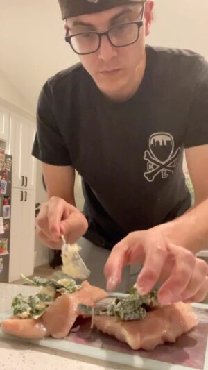 Victor Travagliante Instagram - Anyone that knows me knows I have the diet of a 6 year old - my wife however likes healthier options - soooo tonight I attempted from scratch a garlic spinach stuffed chicken breast! #Hopeshelikesit #Homecooking #Husband 😳