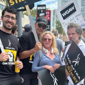 Virginia Madsen Instagram - Listen up amptp we are NOT a going away. And we are getting louder. @paddywarbucks @narcissusholmes #sagaftra #sagaftrastrike @sagaftra