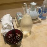 Virginia Trioli Instagram - In 1997, as the first snow flurries of winter dusted Tokyo, Russell and I stepped out of a tiny Juban sushi bar, having had some of the best sushi of our life. I was determined to find it again, but all I had was this photo. Swipe to see what happened next … #japan #backintokyo #familytravels #virginiatrioli #matsukanazabujuban Matsukan Azabu