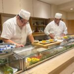 Virginia Trioli Instagram - In 1997, as the first snow flurries of winter dusted Tokyo, Russell and I stepped out of a tiny Juban sushi bar, having had some of the best sushi of our life. I was determined to find it again, but all I had was this photo. Swipe to see what happened next … #japan #backintokyo #familytravels #virginiatrioli #matsukanazabujuban Matsukan Azabu