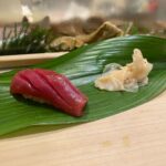 Virginia Trioli Instagram - In 1997, as the first snow flurries of winter dusted Tokyo, Russell and I stepped out of a tiny Juban sushi bar, having had some of the best sushi of our life. I was determined to find it again, but all I had was this photo. Swipe to see what happened next … #japan #backintokyo #familytravels #virginiatrioli #matsukanazabujuban Matsukan Azabu