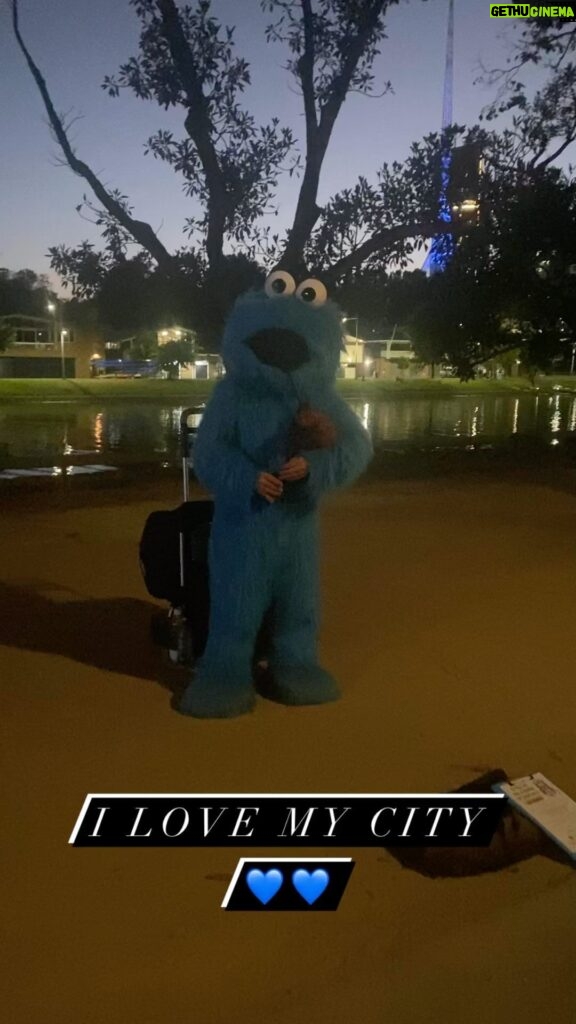 Virginia Trioli Instagram - Melbourne, 9pm, first night of the #ausopen - Grover on the pipes. EDITED UPDATE: It’s the Cookie Monster! Doh! #melbourne #ausopen #summer #bagpipe Birrarung Marr, Melbourne