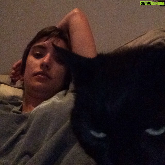 Wes Craven Instagram - My #blackcat Loquita in a foul mood. Not allowed to watch Animal Planet during Law and Order. (Pictured here with my stepdaughter Nina)