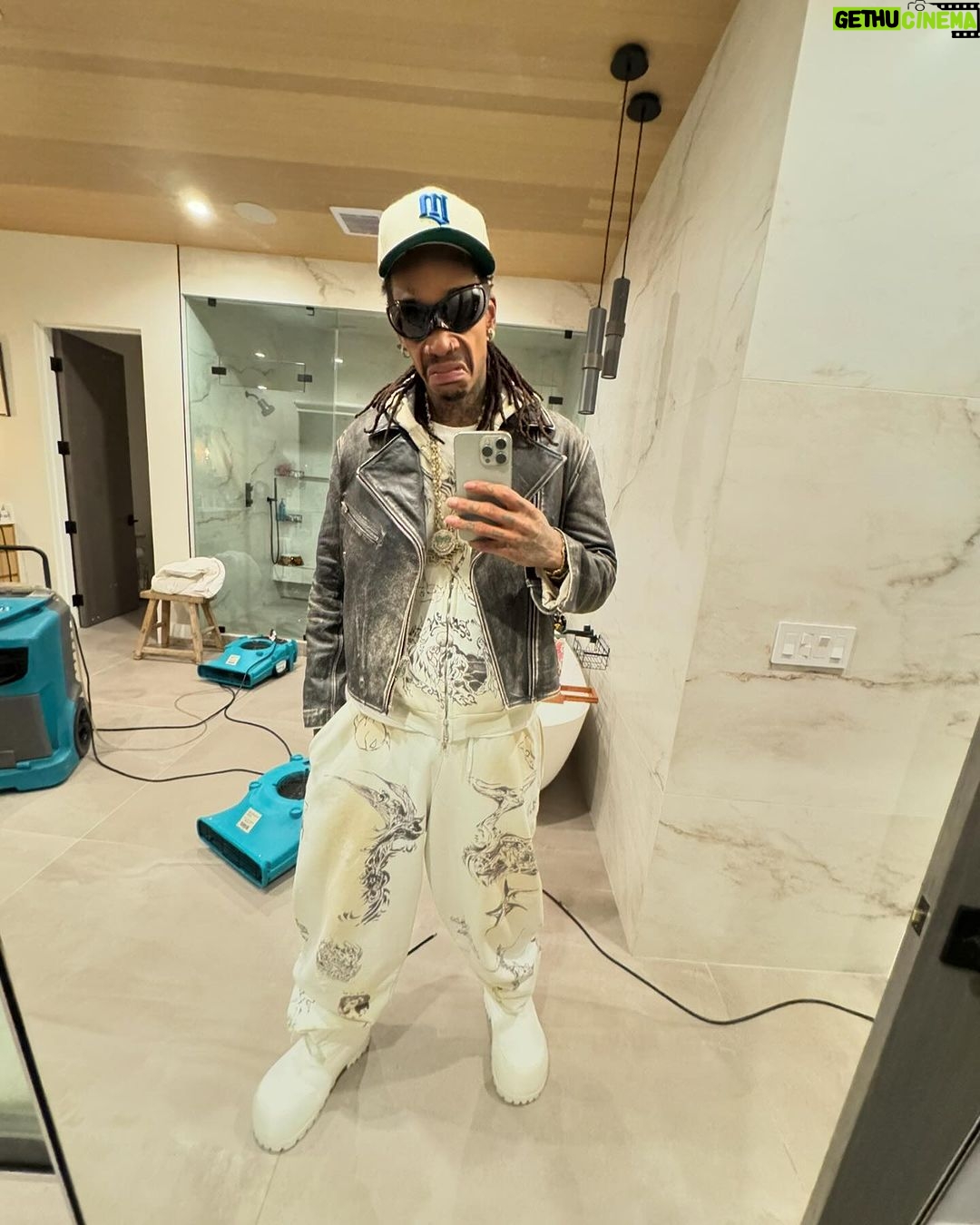 Wiz Khalifa Instagram - All white I got Range too.