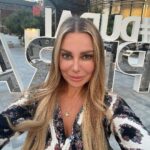 Xenia Seeberg Instagram - Good morning everyone. The Opera district. Our new neighborhood! How do you like the cone art behind me? Have a nice weekend my friends. #dubai #burjkhalifa #dubaiopera #downtowndubai #dubaidowntown The Opera District