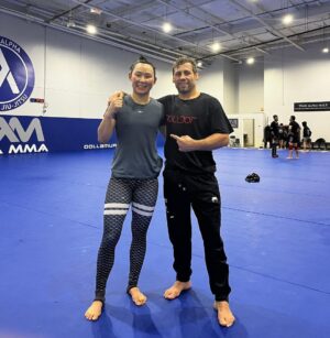 Yan Xiaonan Instagram - Always enjoy the time on the mat with @urijahfaber . There is no substitute for hard work！🤼‍♀️💦

I am ready to step into the octagon again. 💪🔥