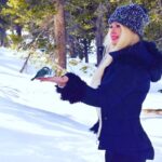 Yvette Rachelle Instagram – 💛💚💙The beauty of #springsnow being at peace in the forest with wildlife #wildbirds The wild birds actually peacefully ate seed from my hand in the mountain wilderness. How amazing💙💜Its Springtime snow but keeping warm in my favorite super cute and soft #Mukluks #beanieseason  #pomhat made with #popcornyarn #lovemukluks💜❤️Now, if all beings could just peacefully co-exist what a more beautiful world it would be….Sending every being on the planet #infinitelove 💙💚and #worldpeace 🌎 Actress #TopModel #animalactivists #yvetterachelle