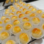 Yvonne Lim Instagram - Anyone has CNY anxiety like me? 🤔 Told myself to take a CNY break this year...not gonna do anything just rest...but i failed again when friends mentioned they missed my cny pineapple balls...😂😜 . Presenting handmade chinese new year goodies made from the heart..huat ah! 🙌🏻 . 孩子们又看到我熬夜马不停蹄地搓搓捏捏手工制作新年礼盒的凤梨酥，费南雪了..🥰😝 . 一份心意，诚意及祝福...向大家介绍我的新年礼盒《好运“龙”来》！🧧🐲 . 经典旺旺来凤梨酥，加上 @alextien 取名为黄金万两凤梨费南雪(Financiers) 还有 “龍宝平安”！你们会喜欢吗？😍😄 . #dragonyeariscoming #chinesenewyeargoodies #chinesenewyeargiftbox #homemade #madewithlove #bakedwithlove #happymummy #myjoyandhappiness #mysunshine #还在赶货中 #朋友们喜欢我就开心 #平安 #健康 #感恩 #