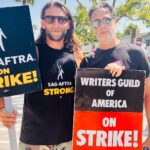 Zach McGowan Instagram - Went down to the studio to join the picket today. Saw some of the amazing writers of some of the awesome jobs I have had the pleasure of doing. Even managed to get some photos with some of them. If you are wondering if this strike is for real, I have not talked with a single writer or actor who isn’t in this for the long haul, however long it takes. FYI if you are on the side of the AMPTP you are wrong here. They are stealing from artist. End of story. I Brought my big girls today. Eventually I will bring the Ranger Crew, the Azgeda army, and all the Russian LMD’s. 🍻⚔️ #sagaftrastrong #wgastrong