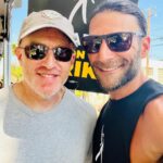 Zach McGowan Instagram - Went down to the studio to join the picket today. Saw some of the amazing writers of some of the awesome jobs I have had the pleasure of doing. Even managed to get some photos with some of them. If you are wondering if this strike is for real, I have not talked with a single writer or actor who isn’t in this for the long haul, however long it takes. FYI if you are on the side of the AMPTP you are wrong here. They are stealing from artist. End of story. I Brought my big girls today. Eventually I will bring the Ranger Crew, the Azgeda army, and all the Russian LMD’s. 🍻⚔️ #sagaftrastrong #wgastrong