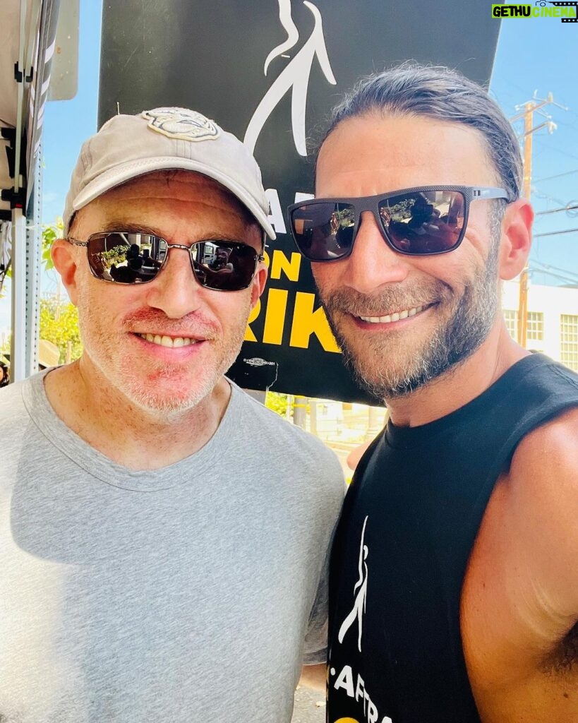 Zach McGowan Instagram - Went down to the studio to join the picket today. Saw some of the amazing writers of some of the awesome jobs I have had the pleasure of doing. Even managed to get some photos with some of them. If you are wondering if this strike is for real, I have not talked with a single writer or actor who isn’t in this for the long haul, however long it takes. FYI if you are on the side of the AMPTP you are wrong here. They are stealing from artist. End of story. I Brought my big girls today. Eventually I will bring the Ranger Crew, the Azgeda army, and all the Russian LMD’s. 🍻⚔️ #sagaftrastrong #wgastrong