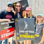 Zach McGowan Instagram - Went down to the studio to join the picket today. Saw some of the amazing writers of some of the awesome jobs I have had the pleasure of doing. Even managed to get some photos with some of them. If you are wondering if this strike is for real, I have not talked with a single writer or actor who isn’t in this for the long haul, however long it takes. FYI if you are on the side of the AMPTP you are wrong here. They are stealing from artist. End of story. I Brought my big girls today. Eventually I will bring the Ranger Crew, the Azgeda army, and all the Russian LMD’s. 🍻⚔️ #sagaftrastrong #wgastrong
