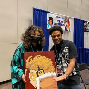 Zeno Robinson Instagram - @dreamconvention was exactly that. A dream come true. I truly love my people, and being surrounded by so many people who look like me, and are into the same things I’m into, truly made me feel at home. I got to link up with my brother @jclh_in_the_morning!! I never got to celebrate what me playing Hawks means to my people, and being able to celebrate not just that victory but all of the blessings God brought to me, at my first in person convention since Hawks and Ogun and Onyankapon, means everything. So many of you came to my table and told me how much it meant to you to see me and hear me on your screens and in your favorite anime and it means the WORLD. It means everything. When you say I inspire you, it’s truly you who inspire ME. I’m humbled, and blessed and driven to work even harder for you and for US. I loved being able to party with my people. I love my people. I love you all!!!! Definitely a highlight of my entire life. Thank you thank you THANK YOU RDC World for inviting me out, and acknowledging me as an artist and actor!! Thank you to @frishmaniac for coordinating and hooking it up. Literally eternally grateful to all of you ❤️❤️❤️❤️
