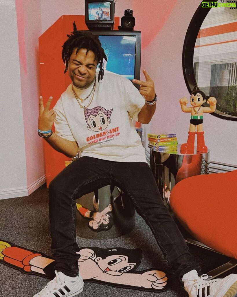 Zeno Robinson Instagram - I hit up @shopgoldenant ‘s Astro Boy pop up in Lil Tokyo the other day! The collection was super cool and I love Astro Boy and old school anime! The aesthetic in the store was one of my favorite parts! The chain and the tshirts were fireeeee. Check them out!! 📸: @krystalshanellee