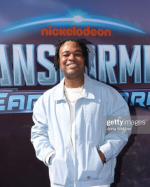 Zeno Robinson Instagram - THANK YOU GODDDDDDDDD!!!!!

AHHHHHH!!! ITS FINALLY OUT!!! #TransformersEarthspark is out RIGHT NOW on @paramountplus and is also being shown on @nickelodeon !!! What a momentous blessing to be able to be a part of this legendary franchise as a brand new original bot, Thrash. I love Transformers and it was really transformative in my career and inspired me as an actor. Thrash is some of the most fun I’ve had recording a character and I really brought my entire heart and soul to him. He’s a big beacon of light and I love being able to play him. I can’t wait for everyone to finally meet him.  PLEASE PLEASE PLEASE GO CHECK IT OUT!!! I’m honored to be a part of something centering around a mixed family, who are clearly black, with an assortment of incredibly diverse characters, on screen and behind the mic and behind the scenes!! The action, humor, and heart in this show really makes it something fresh and unique. Transformers are back baby!!!! 

Thank you so much to the entire team, @ant_ward_ , @grazza5 , @dangkristireed for trusting me with this honor. And to my team! @cesdtalent @lizziocathey thank you so much for helping me get here!!! My Malto family!! @kathreenkhavari , @bennilatham , @zionbroadnax , @officialsydneymikayla , @danielpudi , @baderdiedrich !! LETS GOOOOOOOOOO!!

.
.
.
.
#transformers #nickelodeon #paramount #cartoon #animated #voiceover