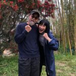 Zhang Meng'er Instagram - Things that you probably don’t know about these people and why I love them. PART 1. P1-Michelle’s wrap day; I thought she was serious before I met her because of the roles she played. But actually she’s a complete goofball that lights up the room with her energy. @michelleyeoh_official P2-Florian and I trying to figure out whose muscles are bigger; well, obviously him. Once he told a joke, I laughed so hard that fell with my chair, and he grab me and my chair with one hand. He’s very afraid of cockroaches. @bignasty P3-🙄when you look at someone who’s so much taller than you P4-Master Yuen’s wrap day; Master Yuen’s always chill. I remember once we were in the makeup trailer, Florian was watching a football game and he screamed suddenly because of a goal. We were all frightened, only Master Yuen so calm, turned around with a smile on his face. He’s a real master. #yuenwah P5-Andy on a boat; Andy may look like a tough fighter, but his real weakness is seasickness. @andyle_official