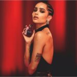Zoë Kravitz Instagram - black opium in a new intensity. over red. #yslbeauty #blackopium