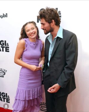Zoe Colletti Instagram - Gigi and Nate hits theaters this Friday! 💜🙈
…………………………………………..

Styling: @shea.daspin 
Dress: @cynthiarowley 
Shoes: @katmaconie 
Bag: @larallan 
Jewelry: @tarinatarantino