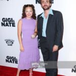 Zoe Colletti Instagram - Gigi and Nate hits theaters this Friday! 💜🙈 ………………………………………….. Styling: @shea.daspin Dress: @cynthiarowley Shoes: @katmaconie Bag: @larallan Jewelry: @tarinatarantino