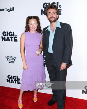 Zoe Colletti Instagram - Gigi and Nate hits theaters this Friday! 💜🙈
…………………………………………..

Styling: @shea.daspin 
Dress: @cynthiarowley 
Shoes: @katmaconie 
Bag: @larallan 
Jewelry: @tarinatarantino