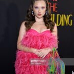 Zoe Colletti Instagram - Season 2 of Only Murders in The Building is streaming NOW! So absolutely honored to be a part of this incredible cast 🎀🤍 …………………………………………………… Styling: @shea.daspin Hair: @scottkinghair Makeup: @lilly_keys Dress: @alamourthelabel Bag: @susan_alexandra Shoes: @shoedazzle Jewelry: @mahrukh.akuly.jewelry Los Angeles, California