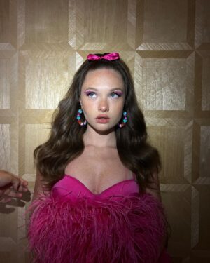 Zoe Colletti Instagram - Season 2 of Only Murders in The Building is streaming NOW! So absolutely honored to be a part of this incredible cast 🎀🤍
……………………………………………………
Styling: @shea.daspin 
Hair: @scottkinghair 
Makeup: @lilly_keys 
Dress: @alamourthelabel 
Bag: @susan_alexandra 
Shoes: @shoedazzle 
Jewelry: @mahrukh.akuly.jewelry