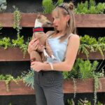 Zoe Colletti Instagram - Just a lil kiss 😚 …………. Check out @iggywearstudio.gls for the most amazing handmade iggy clothes! Louis says thanks for the new fit 🥰🥰 Los Angeles, California