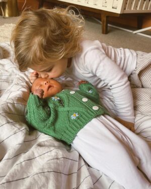 Zoe Sugg Instagram - Novie has been here for almost 2 weeks now & there are honestly too many highlights to share from those 2 weeks! It already feels like she’s always been here ♥️ I just keep looking at her and thinking “how did I grow you? How were you inside me?” 

1. I forgot how angelic newborns were when they slept! 
2. A visit from the @spacenk girls & Father Christmas which absolutely made Otties day!
3. Snuggles all day everyday 
4.🎄 
5. Sisters ♥️ 
6. Teeny tiny hands
7. 100 hour brownie delivery from @theannaedit which has kept us going 😋 
8. The scrunch inside the slightly oversized baby grow 🥹 
9. Headed out for the evening to visit @onegardenbrighton light trail which was SO GOOD (highly recommend) 
10. Reading Ottie her advent books every evening is one of my highlights of the day ♥️