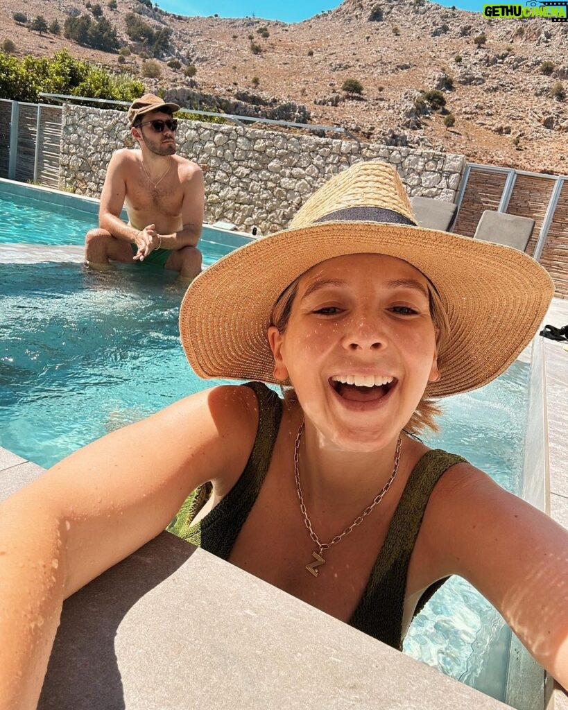 Zoe Sugg Instagram - Thought I’d share some photos from our recent babymoon! We headed to Rhodes and stayed at @casacookhotels which we’d seen Alfie’s fam visit earlier in the year and we instantly knew we’d also love it there. We weren’t looking for a city break or anything with activities (hello third trimester) so somewhere where we could just relax, get massages, read books, dip in the pool & eat delicious food for 5 days was the answer and it was perfect for that! (I’m still thinking about their breakfast buffet) 1. 28 week bump! I don’t feel like I’ve taken half as many photos of my body & bump this pregnancy so we made sure we got some whilst we were away. I actually have a photo wearing this same swimming costume when pregnant with Ottie at around 26 weeks so it’s nice to have them both! 2. Bumpin bumpin. Side note, this swimming costume was an Asos special about 3 years ago and it’s still one of my favourites. Something about the cut that is so flattering and comfy, even with a growing bump! 3. Did a LOT of this! I’m about 300 pages into this book and LOVING it, have you read it? 4. Ate a lot of this, and now I must find somewhere in brighton that sells it 🕵️‍♀️ (or attempt to make it myself…) 5. Off to breakfast! 6. The main pool area. Loved the mountain backdrop 7. Another off to breakfast shot 8. I pretty much lived in this little section of the pool to keep me and bump cool 9. Off to dinner this time 😂 10. Chilling ☀️ Casa Cook Rhodes