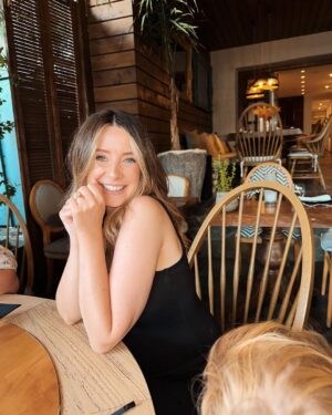 Zoe Sugg Instagram - Mykonos snippets part 2 ☀️ 

1. Early morning paddles in the pool
2. Breakfast spread of dreams
3. Got all dressed up for Alfie’s pre 30th celebrations 
4. Her little face melts me in this photo 🥹
5. The day this happened!!
6. The photo I sent @markyyferris haha
7. Mykonos town 
8. Can you tell I was in a happy little bubble that night? My smile says it all here ♥️ 
9. Ottie embracing the Mykonos wind! Haha
10. Looking at the boats together 🥰