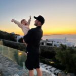 Zoe Sugg Instagram - Mykonos snippets part 2 ☀️ 1. Early morning paddles in the pool 2. Breakfast spread of dreams 3. Got all dressed up for Alfie’s pre 30th celebrations 4. Her little face melts me in this photo 🥹 5. The day this happened!! 6. The photo I sent @markyyferris haha 7. Mykonos town 8. Can you tell I was in a happy little bubble that night? My smile says it all here ♥️ 9. Ottie embracing the Mykonos wind! Haha 10. Looking at the boats together 🥰