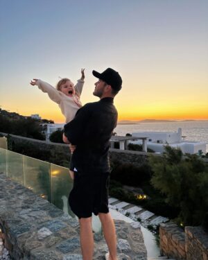 Zoe Sugg Instagram - Mykonos snippets part 2 ☀️ 

1. Early morning paddles in the pool
2. Breakfast spread of dreams
3. Got all dressed up for Alfie’s pre 30th celebrations 
4. Her little face melts me in this photo 🥹
5. The day this happened!!
6. The photo I sent @markyyferris haha
7. Mykonos town 
8. Can you tell I was in a happy little bubble that night? My smile says it all here ♥️ 
9. Ottie embracing the Mykonos wind! Haha
10. Looking at the boats together 🥰