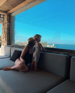 Zoe Sugg Instagram - Mykonos snippets part 2 ☀️ 

1. Early morning paddles in the pool
2. Breakfast spread of dreams
3. Got all dressed up for Alfie’s pre 30th celebrations 
4. Her little face melts me in this photo 🥹
5. The day this happened!!
6. The photo I sent @markyyferris haha
7. Mykonos town 
8. Can you tell I was in a happy little bubble that night? My smile says it all here ♥️ 
9. Ottie embracing the Mykonos wind! Haha
10. Looking at the boats together 🥰