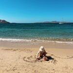 Zoe Sugg Instagram - Snippets of Mykonos ☀️ Was terrible at posting whilst we were away but had so many lovely memories captured I wanted to share! So here is the first of a few Mykonos memory posts 👌 1. Little candid family moment on the beach 2. Ottie loved running in and out of the sea 3. Just loved this photo ♥️ 4. Honestly think she would do this all day if she could 5. In the town! 6. She looked so cute on these stairs 7. Making new friends 🐱 8. 🤤🤤🤤 9. Choosing her ice cream, she could not believe how many flavours there were! 10. Settled on a cookies and cream 😝