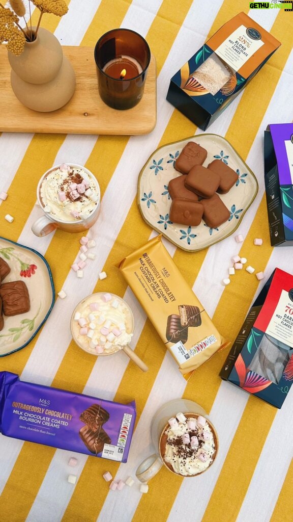 Zoe Sugg Instagram - ad | I’m back again with @marksandspencerfood , doing one of my favourite videos, trying out some of their new in products! Do we all agree that cosy days & autumnal season is now here because this month, @marksandspencer launched new biscuits and hot drinks, and what better time than going into autumn with a hot chocolate and chocolate biscuit (and may I suggest you do this under a blanket in front of a crackling fire for full enjoyment) Today, I’m taste testing their Collection Belgian Hot Chocolate Flakes! They have a Dark, Blond and Milk Chocolate version, so something to suit everyone, and the best part… their Outrageously Chocolatey Milk Chocolate Coated Custard Creams and Bourbon Creams! 😍 (guys, you’re not ready for these, RUN DON’T WALK!) There’s so much newness across the Foodhall this month, so make sure you keep your eyes peeled (especially in the biscuit aisle) which of these are you going to try? 😄 #MyMarksFave