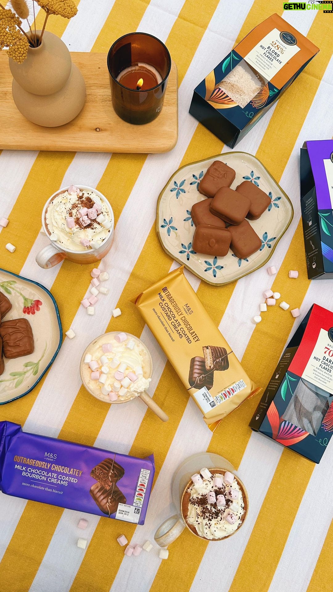 Zoe Sugg Instagram - ad | I’m back again with @marksandspencerfood , doing one of my favourite videos, trying out some of their new in products! Do we all agree that cosy days & autumnal season is now here because this month, @marksandspencer launched new biscuits and hot drinks, and what better time than going into autumn with a hot chocolate and chocolate biscuit (and may I suggest you do this under a blanket in front of a crackling fire for full enjoyment) Today, I’m taste testing their Collection Belgian Hot Chocolate Flakes! They have a Dark, Blond and Milk Chocolate version, so something to suit everyone, and the best part… their Outrageously Chocolatey Milk Chocolate Coated Custard Creams and Bourbon Creams! 😍 (guys, you’re not ready for these, RUN DON’T WALK!) There’s so much newness across the Foodhall this month, so make sure you keep your eyes peeled (especially in the biscuit aisle) which of these are you going to try? 😄 #MyMarksFave