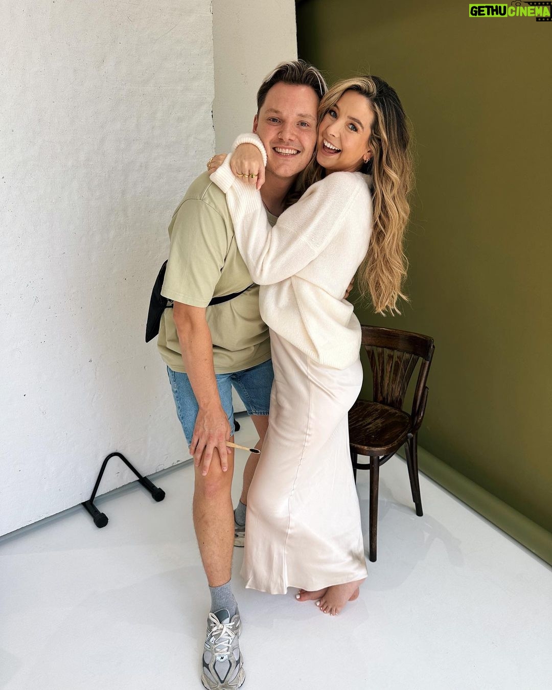 Zoe Sugg Instagram - ad (brand collaboration) ✨ Wanted to share a little BTS of the shoot with @carrie_elizabeth_jewellery and @carrie_elizabeth_dennahy! It was such a fun afternoon and the pictures are some of my favourites ever. Can’t wait to share more of the ‘Intentions Collection’ with you when it launches TOMORROW 🙌🏼 Head to the end of this slide for a sneak peek 👀 Also love that Carrie was pregnant on the last shoot we did for our previous collection and this time I was 🥰 P.S. incredibly talented @_saskialawson behind the lens & equally talented @adamcookehair who gave me THE BEST HAIR that I miss every day since this shoot 🤣