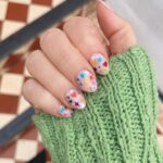 Zoe Sugg Instagram – Birthday nails for next week ✨ probably my favourites so far, they remind me of the sticker earrings we all wore in the 90’s as kids and I couldn’t be more obsessed!
