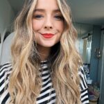 Zoe Sugg Instagram - It’s been a while since I posted a selfie so here is one featuring Otties overflowing wash basket in the background 😅