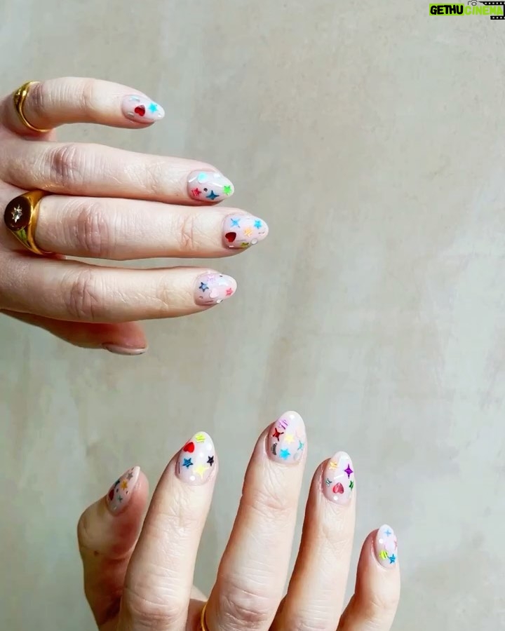 Zoe Sugg Instagram - Birthday nails for next week ✨ probably my favourites so far, they remind me of the sticker earrings we all wore in the 90’s as kids and I couldn’t be more obsessed!
