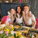 Zoe Sugg Instagram – Thought I’d post my weekly update tomorrow and do a little run down of today here this evening instead ✨ 

We had such a lovely day today celebrating our mums @traceysugg & @amandadeyes 

1. Me & Mum in 1993 
2. We did some spring wreath making (siblings & mums) which was so much fun! Both mums are very crafty & love their flowers so we thought it would be a nice thing to sit and do together 🌸
3. Mamas 
4. Me, Mum & Joe 
5. Ottie was very happy with her dress 
6. All the partners joined us for an afternoon tea! I made the scones and sandwiches and the cakes were from @julienplumartcafe 
7. May have over baked the scones slightly but they were tasty! 
8. Me & Pops ♥️ 
9. The little lady who made me a Mummy! I feel so lucky to have her, my whole 🌍 
10. Playing with Auntie Dot
