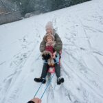 Zoe Sugg Instagram - Ottie’s first snow! (Also I think it’s the first time it’s snowed during vlogmas?) 🌨️ p.s. we did put mittens on her and they lasted all of 5 mins before she shook them off and didn’t want to wear them anymore. HOW do you get toddlers to wear mittens/gloves? 😂🫠