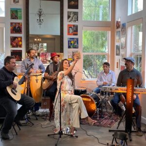 Zoe Viccaji Instagram - We were wondering where to shoot the performance video, and then we thought why not just stay home! This beautiful living room space, natural green in the windows, Shonu’s record collection on the wall, an outfit whipped up in a few ideas by the genius @1beela and voila! Loved performing with these gentlemen- shall share details soon. Looking forward to showing this to all of you at the end of this month ❤️ #pakistanmusic #legendsliveforever