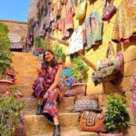 Aahana Kumra Instagram - How can I talk about Rajasthan and not see Colors! 😘🌞 I love how vibrant this state is! And unapologetically! Just like India! It has Colors of all kinds! And that’s what makes this state one of my favourite ever!! 🩷❤️🩵💛💙🧡💚💜 The people, The warmth, The food, The shopping, The experiences! One of a kind! No wonder they say “Padhaaro mhaare des!”🌞🏜️🐪🌞🩷#rajasthan #jaisalmer . . . . #rajasthandiaries #rajasthantourism #aahanakumra #solofemaletraveler #jaisalmerfort #jaisalmerdiaries #jaisalmerdesert #india #incredibleindia #rajasthandiaries #travel #traveltheworld #travelphotography #travelling #travellife #travelgram #instatravel Golden Fort - Jaisalmer