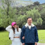 Aakriti Rana Instagram - Made it to Hollywood! 😋 It’s raining here in LA and it’s pretty chilly. The last time I was here was in Feb 2020 and the weather was beautiful and sunny. I’ve pretty much seen a lot of LA but if there’s anything you absolutely love doing here the most or if there’s something really unique then comment below and let me know. Here for a day and then heading to a new place I’ve been meaning to visit since a long time! 😀 P.s look at the doggy doing poo poo with a view! Kya life hai #aakritirana #losangeles #LA #travelblogger #indiantravelblogger #AakritiInUSA #Hollywood #travelphotography #outfitoftheday #familytrip Hollywood, California