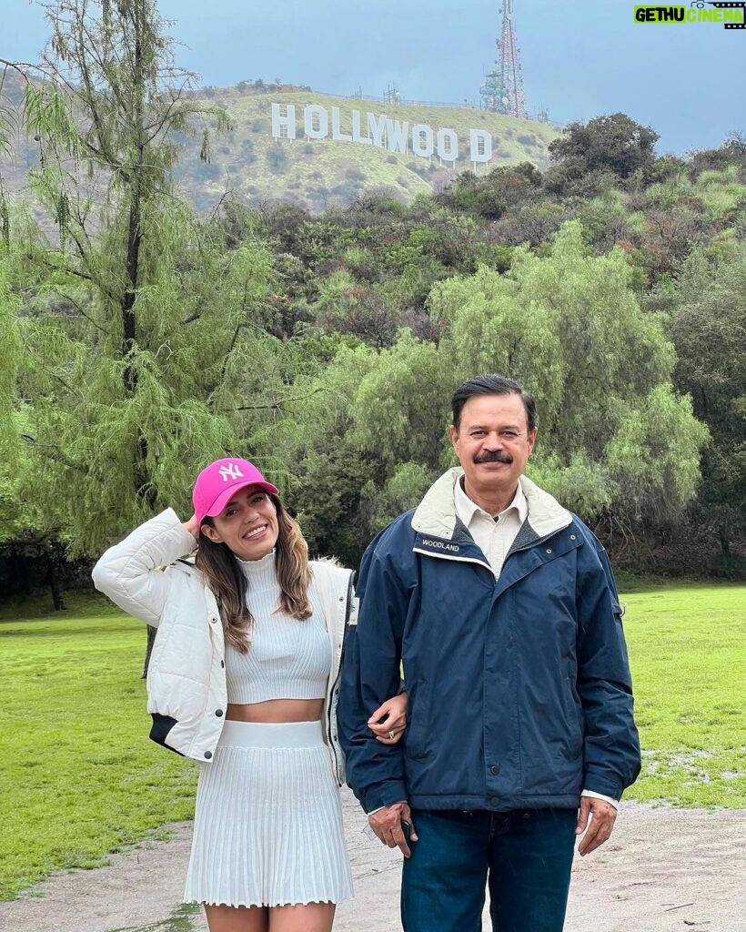 Aakriti Rana Instagram - Made it to Hollywood! 😋 It’s raining here in LA and it’s pretty chilly. The last time I was here was in Feb 2020 and the weather was beautiful and sunny. I’ve pretty much seen a lot of LA but if there’s anything you absolutely love doing here the most or if there’s something really unique then comment below and let me know. Here for a day and then heading to a new place I’ve been meaning to visit since a long time! 😀 P.s look at the doggy doing poo poo with a view! Kya life hai #aakritirana #losangeles #LA #travelblogger #indiantravelblogger #AakritiInUSA #Hollywood #travelphotography #outfitoftheday #familytrip Hollywood, California